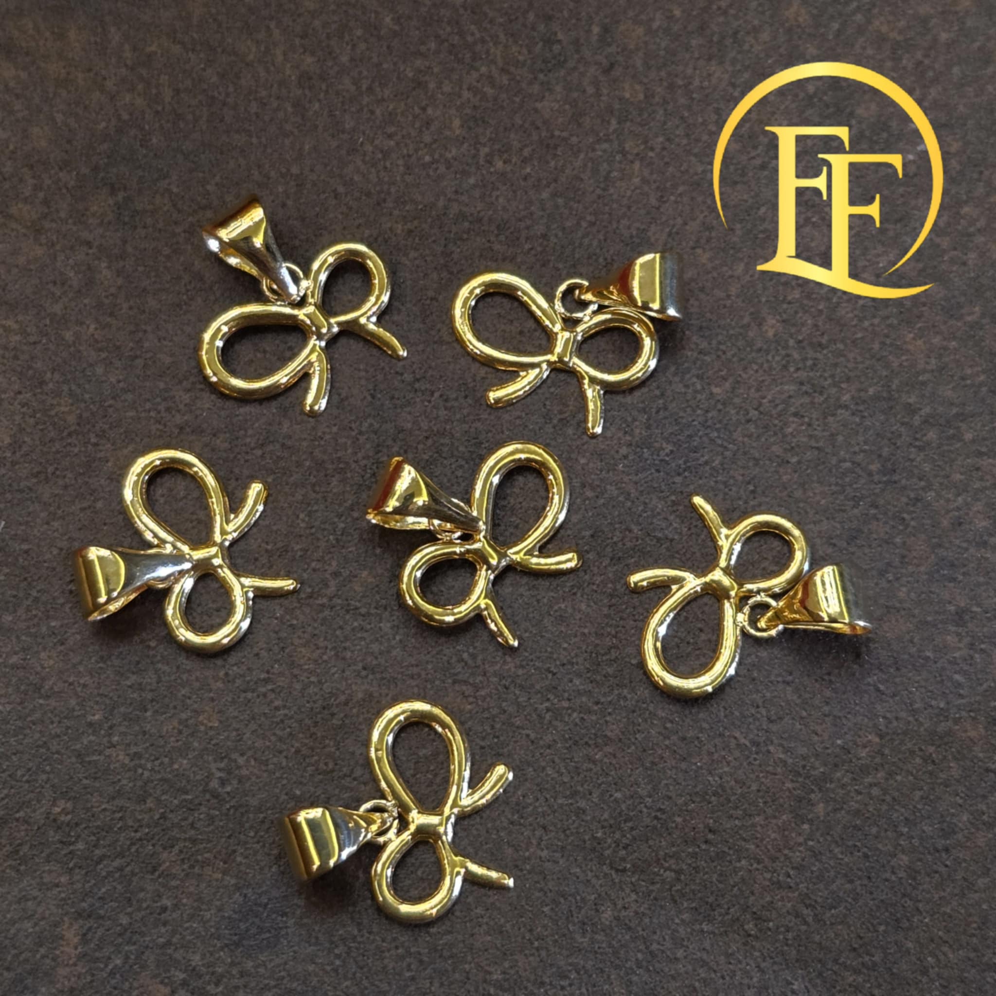 Cute Ribbon Gold Pendant